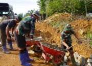 Di Bawah Panas Terik, Satgas TMMD Reguler ke-127 Tetap Eksis Laksanakan Tugas