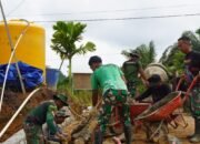 Semangat Gotong Royong Satgas TMMD Reguler ke-127 Kodim 1015/Sampit Genjot Pembangunan Siring Badan Jalan
