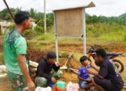 Kedekatan Anak-Anak Dengan Satgas TMMD Reguler ke-127 Dilokasi