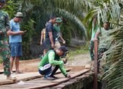 Satgas TMMD Reguler ke-127 Kodim 1015/Sampit Pasang papan dan Pagar jembatan